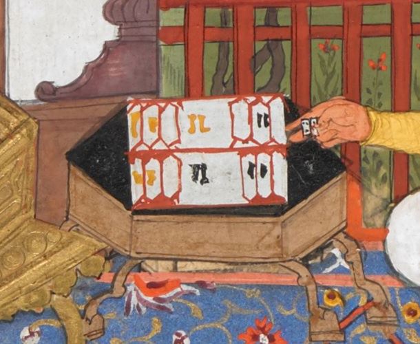 Closeup of the drawing from the above mentioned manuscript showing Bozorgmehr explaining how to play Nard with 2 (and not 1) dice in his hand, and a rather schematic backgammon board.